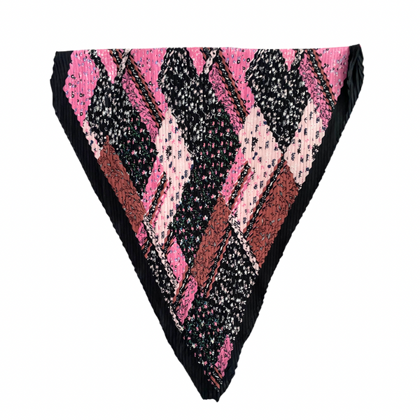 Black and pink patterned triangle-shaped product on a white background