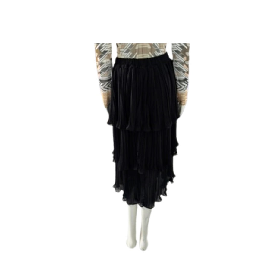 Black ruffled skirt worn by a mannequin on a white background