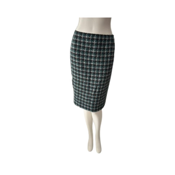 Plaid pencil skirt on a mannequin against a white background