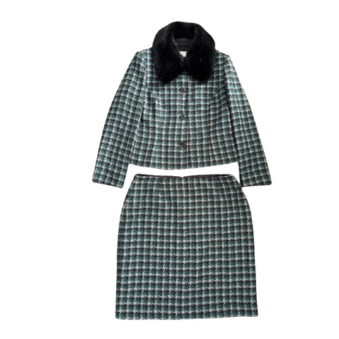 Plaid coat and skirt set with black fur collar on a white background