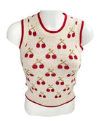 Knitted sleeveless sweater with cherry pattern on a mannequin against a white background