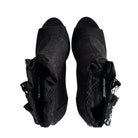 Pair of black lace-up shoes on a white background