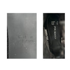 Close-up of a shoe sole with size markings and a Primark label on a white background.