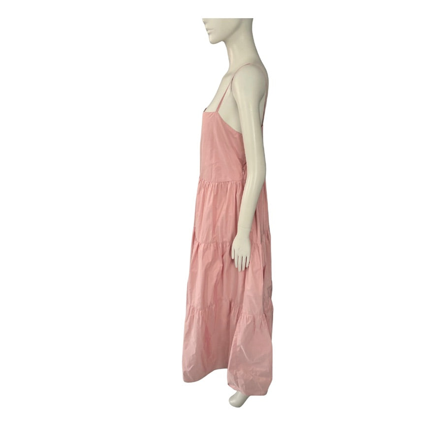 Mannequin wearing a pink dress on a white background