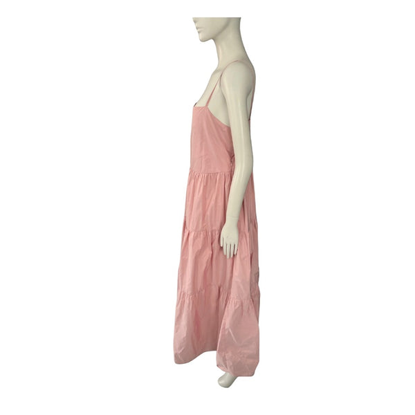 Mannequin wearing a pink dress on a white background