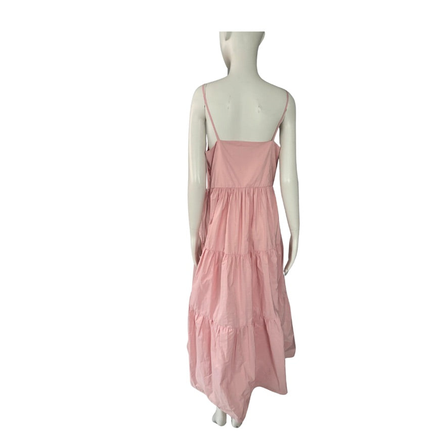 Pink dress on a mannequin against a white background