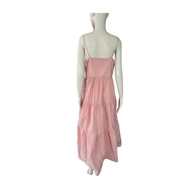 Pink dress on a mannequin against a white background