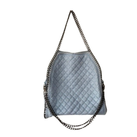 Light blue quilted handbag with chain detail on a white background