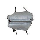 Light blue fabric bag with zippers on a white background