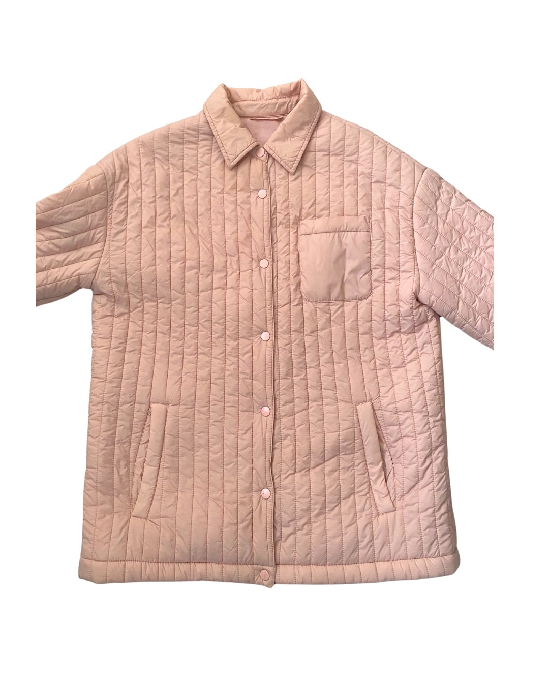 Quilted pink jacket on a white background