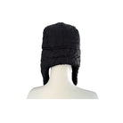 Black quilted winter hat on a mannequin head against a white background