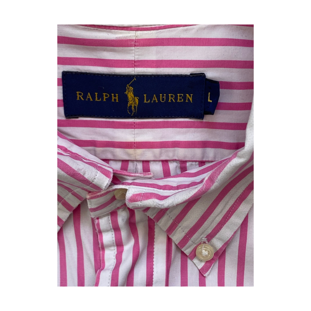Pink and white striped shirt with Ralph Lauren label on a white background