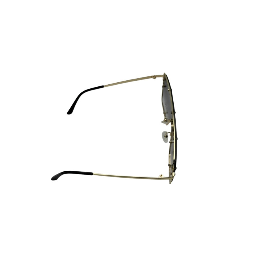 Pair of eyeglasses with gold frame and black temple tips on a white background