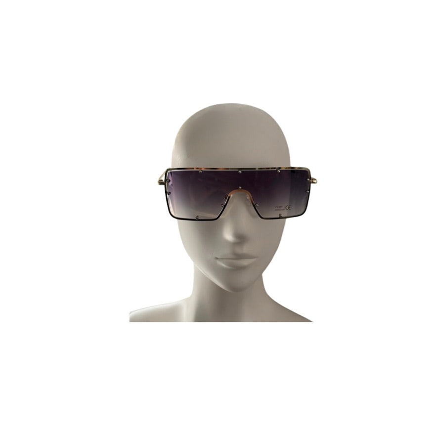 Sunglasses on a mannequin head against a white background