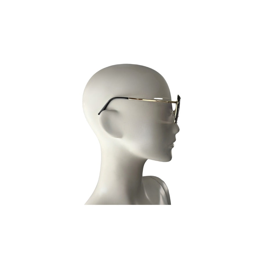 Mannequin head wearing a gold-framed eyeglasses on a white background