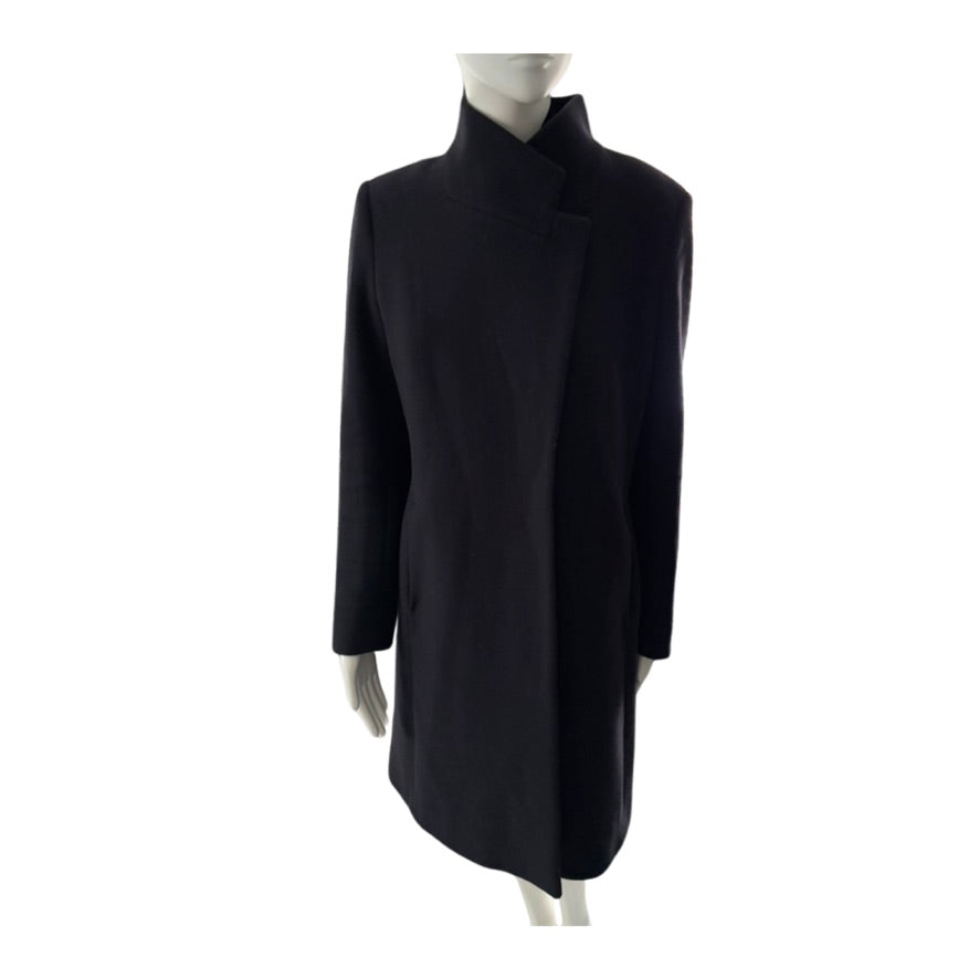 Navy coat on a mannequin against a white background