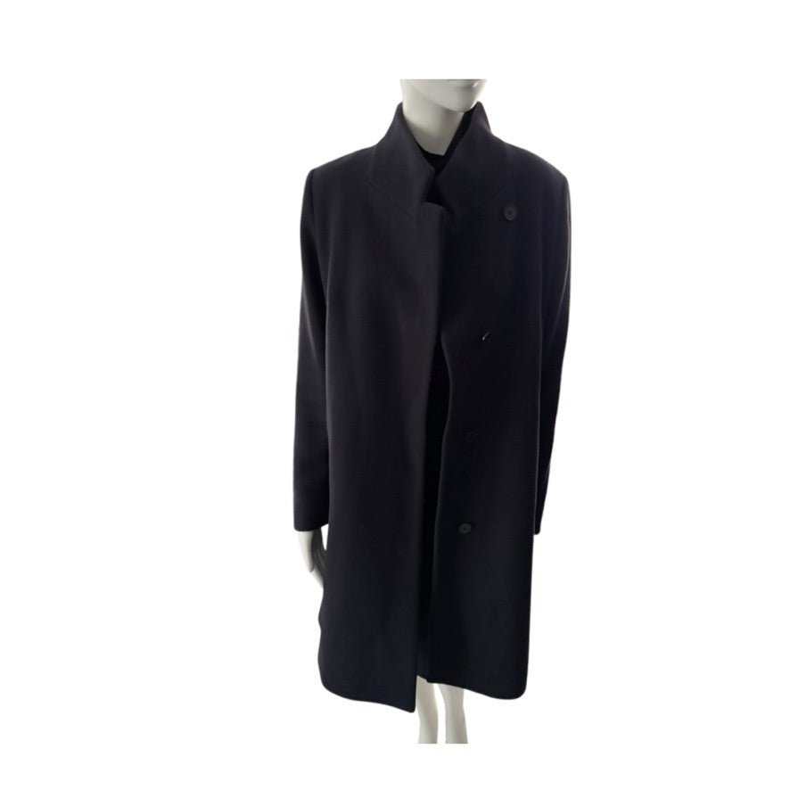 Navy  coat on a mannequin against a white background