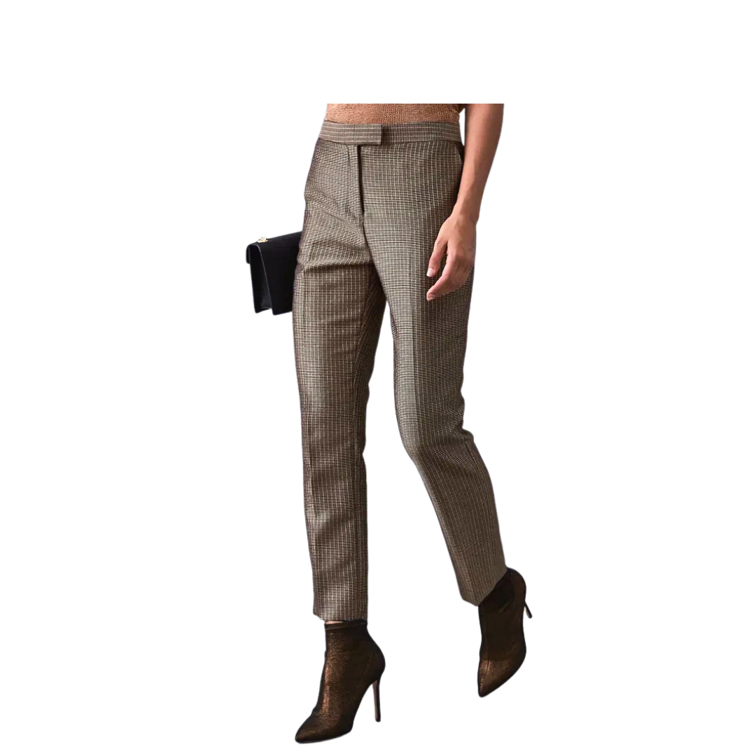 Checkered pants worn by a person on a white background