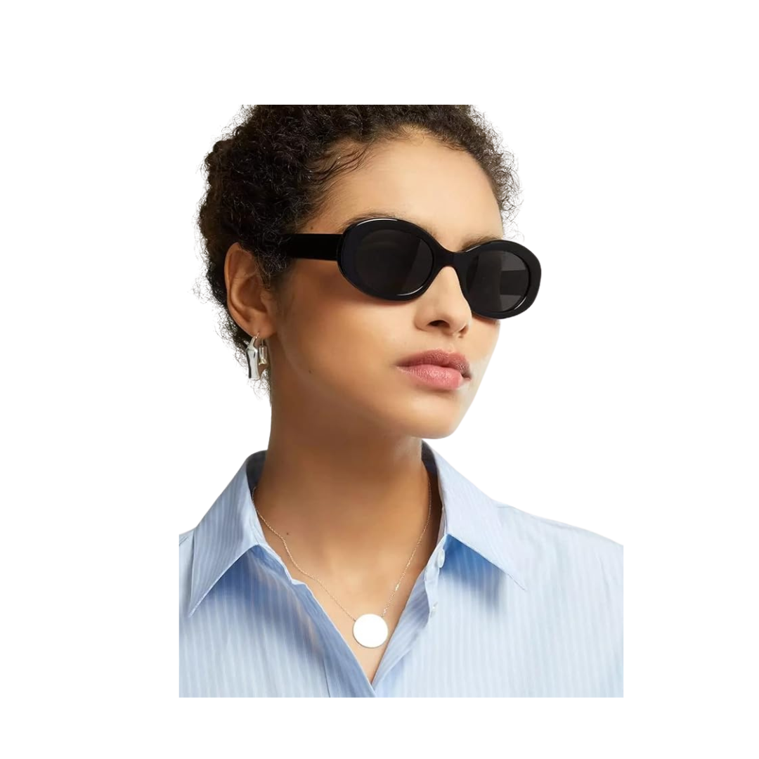 Woman wearing black sunglasses with a white background