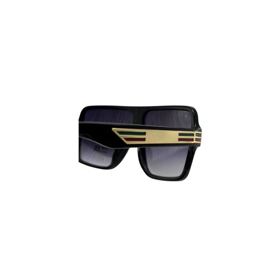 Black sunglasses with gold accents on a white background