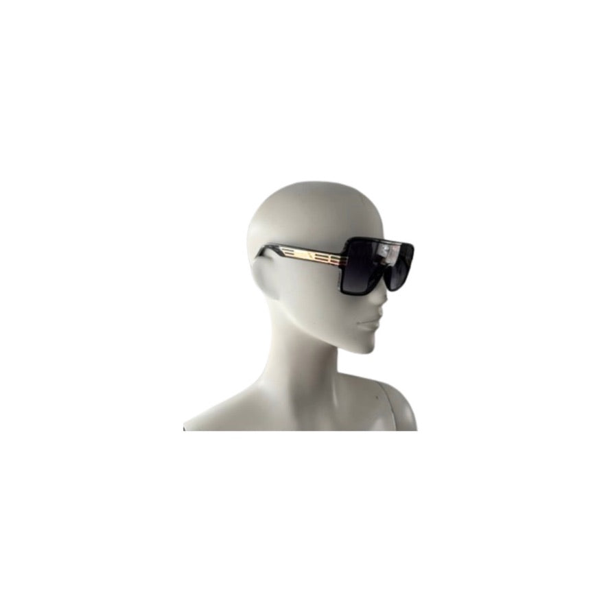 Sunglasses on a mannequin head against a white background
