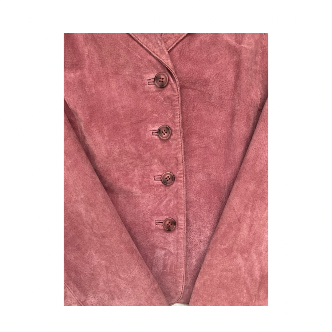 Close-up of a pink suede jacket with buttons on a white background