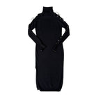 Black dress with long sleeves and decorative elements on a white background