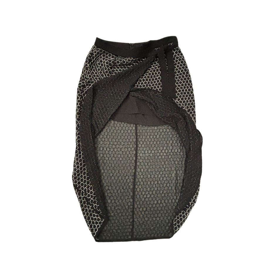Black mesh bag with honeycomb pattern on a white background