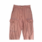 Pink cargo pants on a white background
