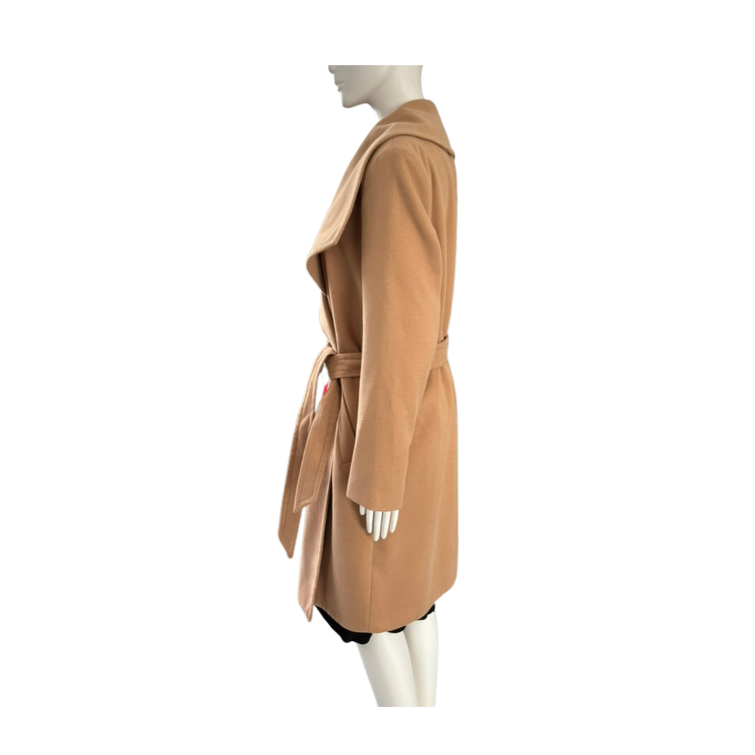 Mannequin wearing a tan coat on a white background