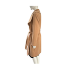 Mannequin wearing a tan coat on a white background