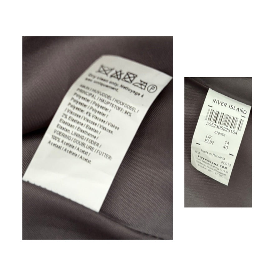 Clothing labels with text and branding on a fabric background