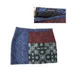 Patchwork skirt with various patterns on a white background