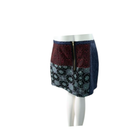 Skirt with patterned design on a mannequin against a white background