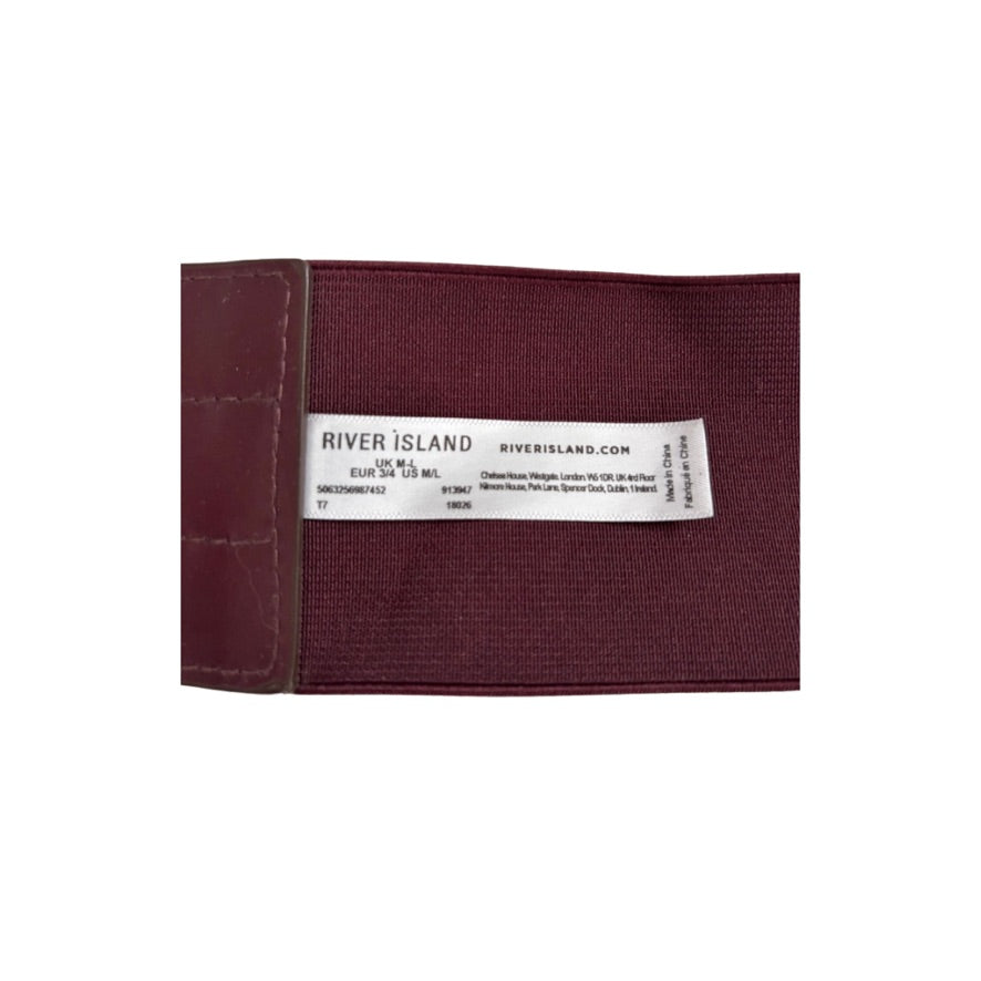 Maroon fabric with a River Island label on a white background