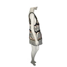 Mannequin wearing a black and white patterned dress on a white background