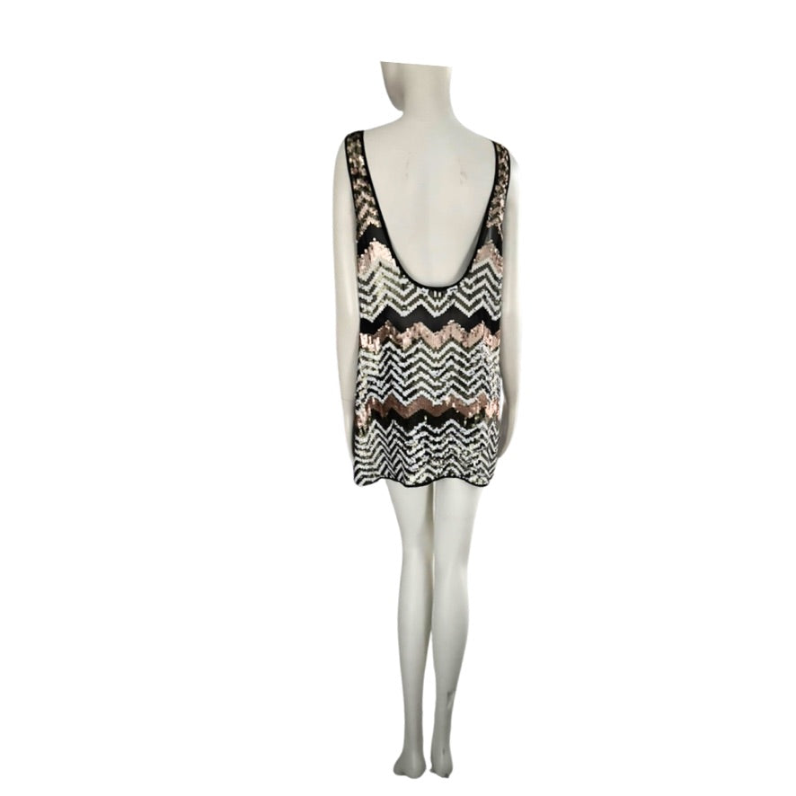 Mannequin wearing a patterned dress on a white background