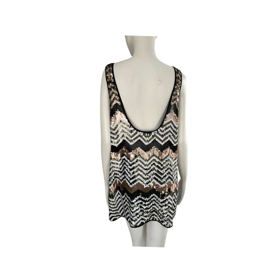 Mannequin wearing a patterned sleeveless top on a white background