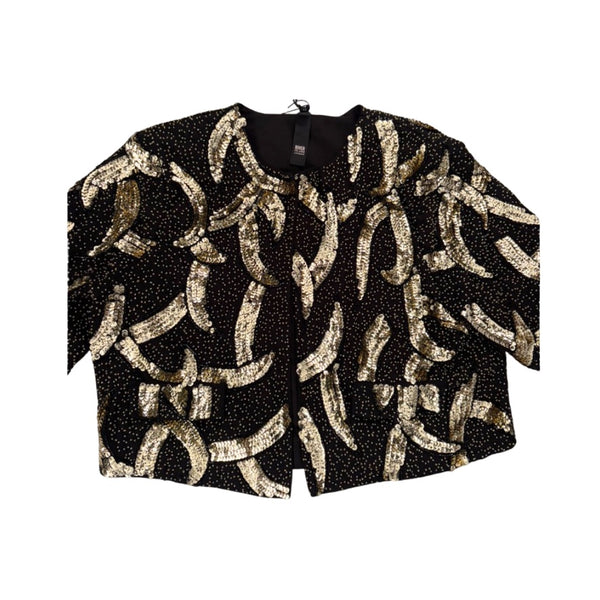 Black top with gold sequin patterns on a white background