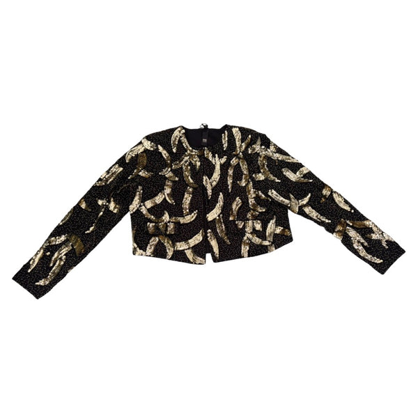 Black sweater with gold abstract pattern on a white background