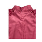 Close-up of a pink satin garment on a white background
