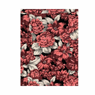 Floral patterned fabric with coral, cream, and black colors on a white background