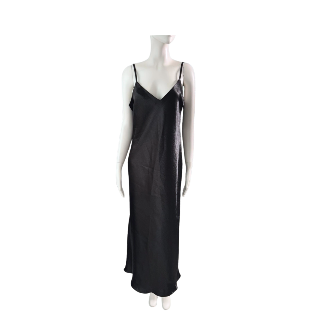 Black slip dress on a mannequin against a white background
