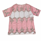 Pink top with silver embellishments on a white background