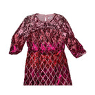 Pink sequin dress on a white background