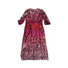 Pink and red patterned dress on a white background