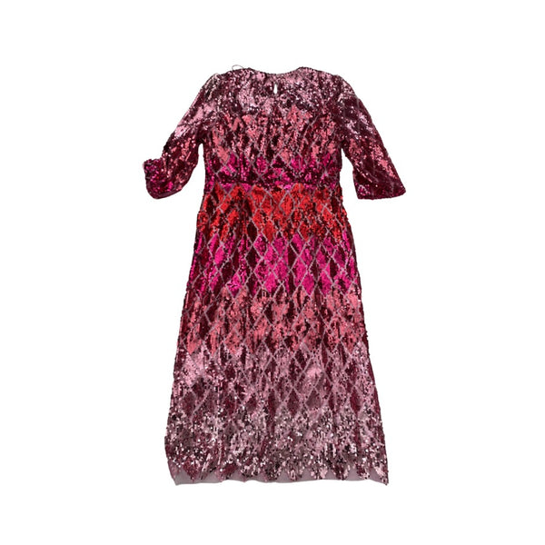 Pink and red patterned dress on a white background