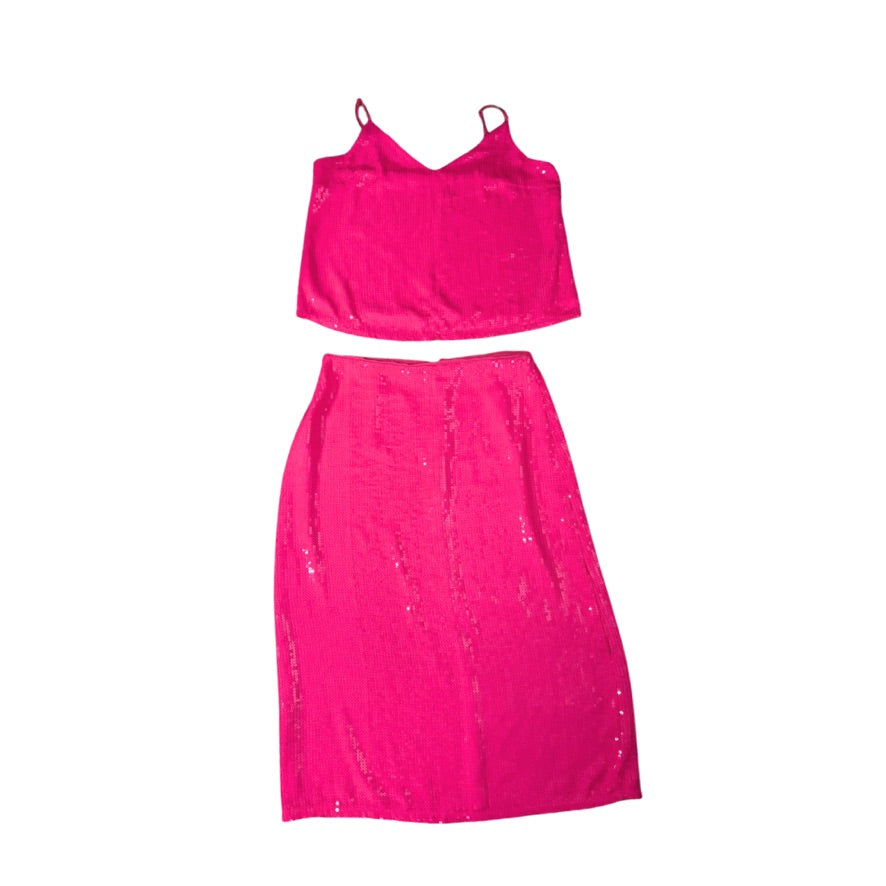 Pink top and skirt set on a white background