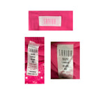Close-up of a pink garment with 'Savida' label showing size information.