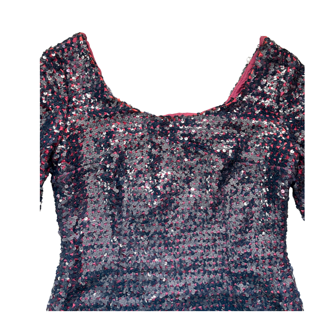 Sequined top with a scoop neckline on a white background